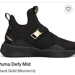 Puma Defy Mid Women's Slip-On Sneaker in Black and Gold